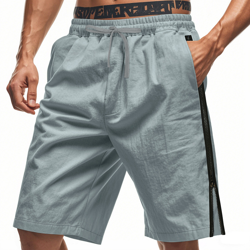 Estación independiente transfronteriza de hombres europeos y estadounidenses verano rápido secado transpirable laterales cremallera TK deportivo relajado pantalones cortos casuales de fitness