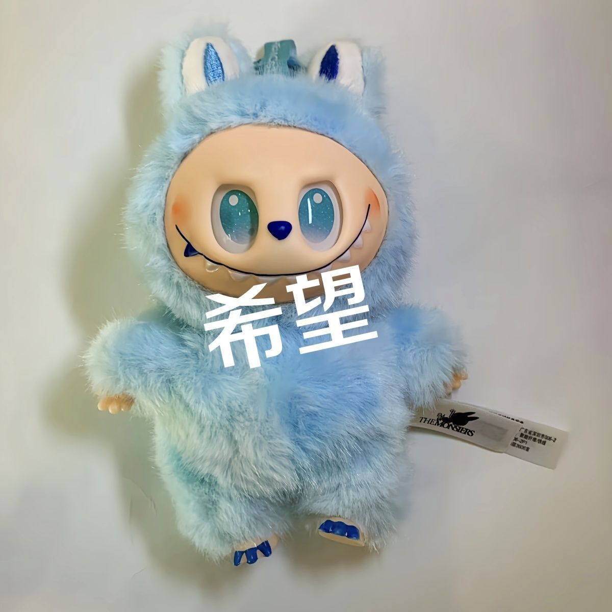 Ventas directas nuevas muñecas de pelusa labubu bra tipo colgante pequeño agarrar muñeca de moda jugar