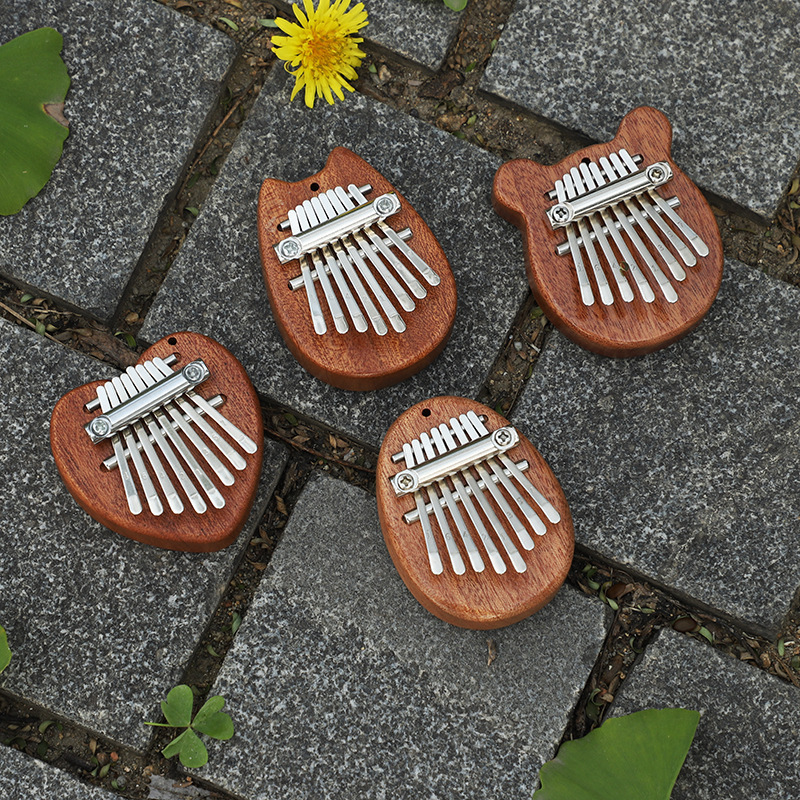 En stock al por mayor 8-tono pulgar piano mini kalinba piano dedo piano Cristal Kalimba pulgar piano pequeño instrumento musical