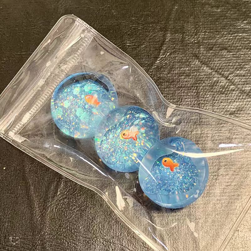 新しいオーシャンプラネット金魚ピンチスパンコールベント人形減圧おもちゃバッグジュエリーペンダント|undefined