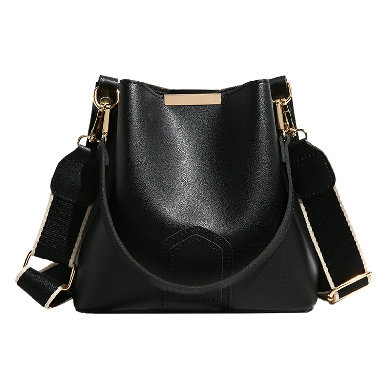 Cross-border textured bucket bag for women 2023 new fashion commuter portable shoulder bag contrast color wide shoulder strap messenger bag