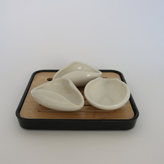A pure white porcelain tea scoop and tea separator set, including a Dehua white porcelain tea scoop, Pu-erh silver bamboo root tea scoop, and tea strainer, available for single piece shipping.