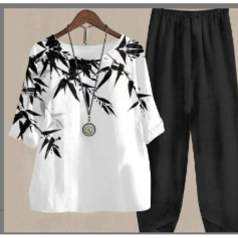 Europa y Estados Unidos trajes casuales de mujer transfronterizos de moda explosiva verano nuevo cinco mangas impresión chaqueta pantalones dos piezas