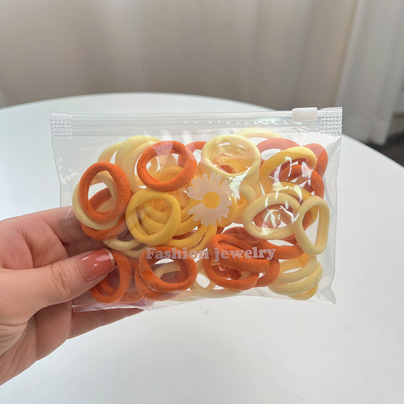 Los niños no hacen daño cuerda de pelo anillo de pelo pequeño pulgar hembra color caramelo cabeza cuerda sin costuras alta banda elástica femenina corbata cabeza