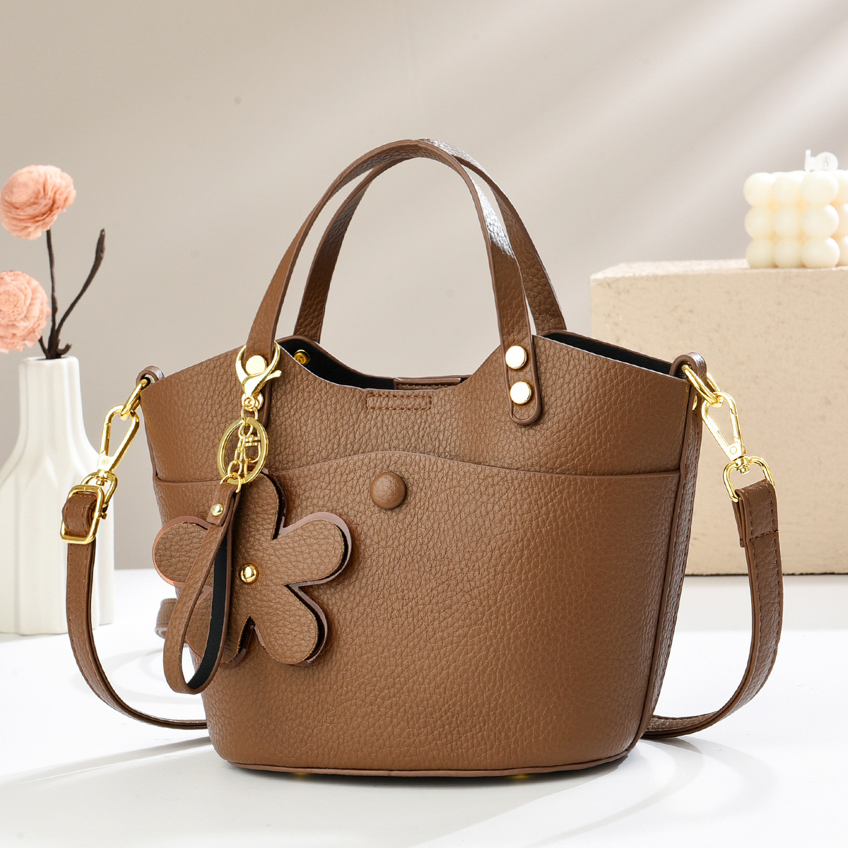 Exquisita bolsa de balde de verano 2025 nueva bolsa de hombro versátil textura mochila bolsos casuales bolsos transfronterizos