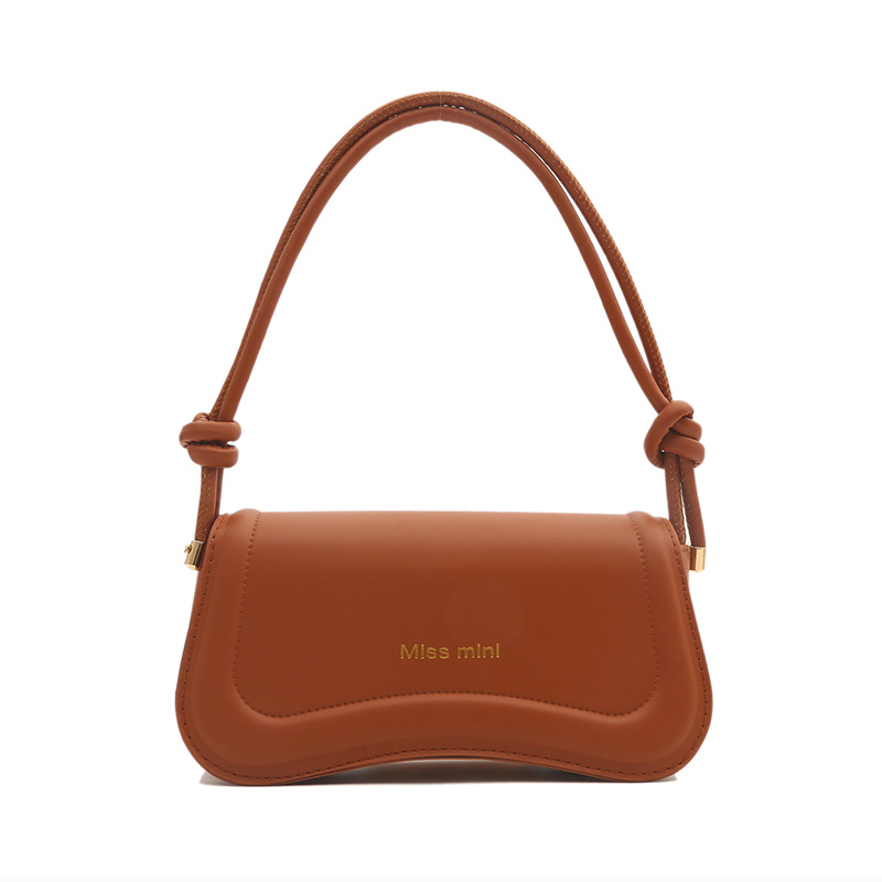 Textura bolso de axila portátil 2024 primavera nueva moda bolso de mensajero francés color sólido bolso cuadrado pequeño retro de un solo hombro