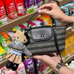 女性用の新しい夏の餃子バッグ、ストライプのレトロなスタイルの牛革、多用途のデザイン、カジュアルでポータブルなクロスボディ