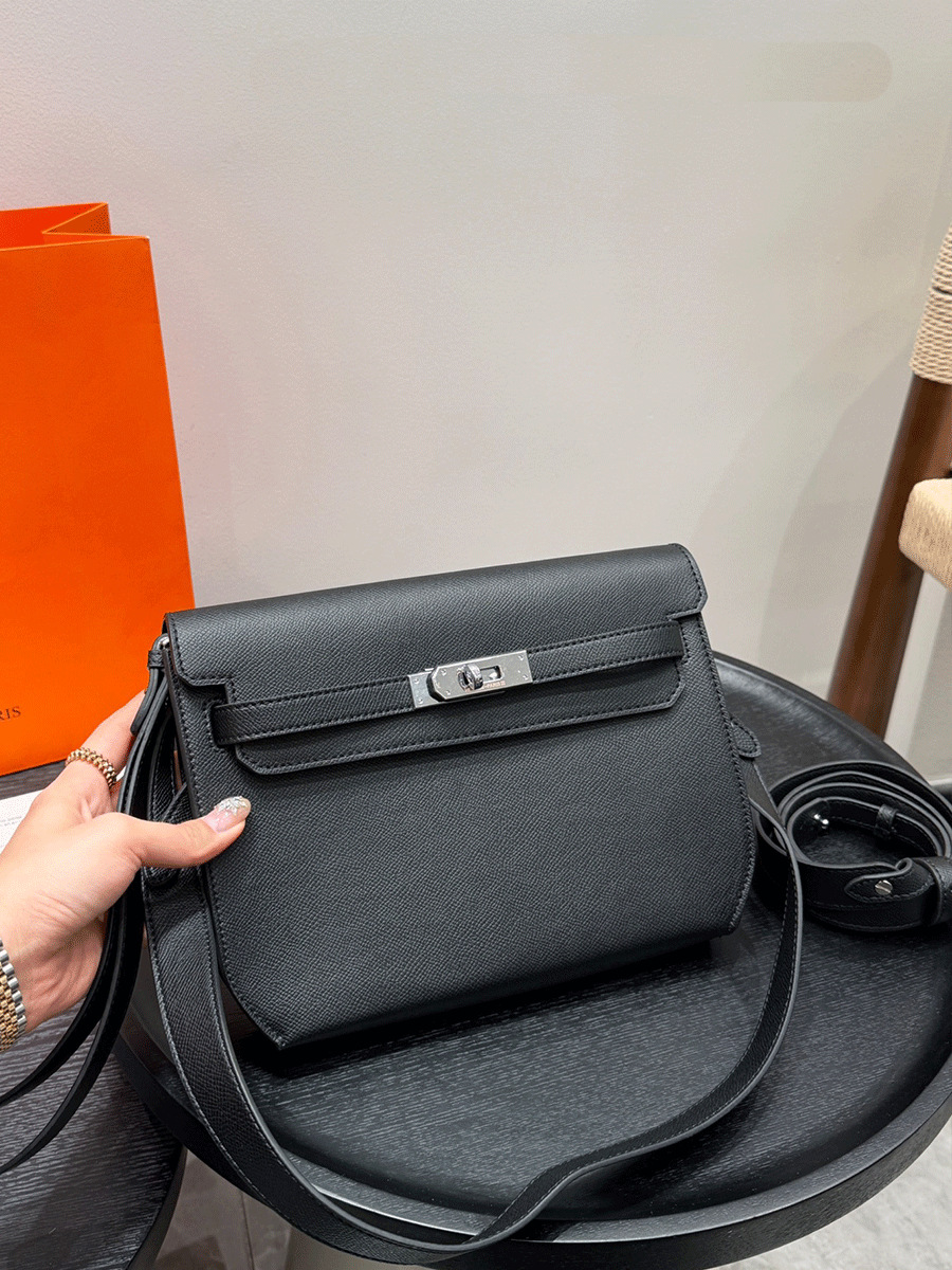 Cuero genuino retro cabeza de piel de vaca bolso de Kelly bolso Depeches bolso de mochila ancho cinturón de hombro único