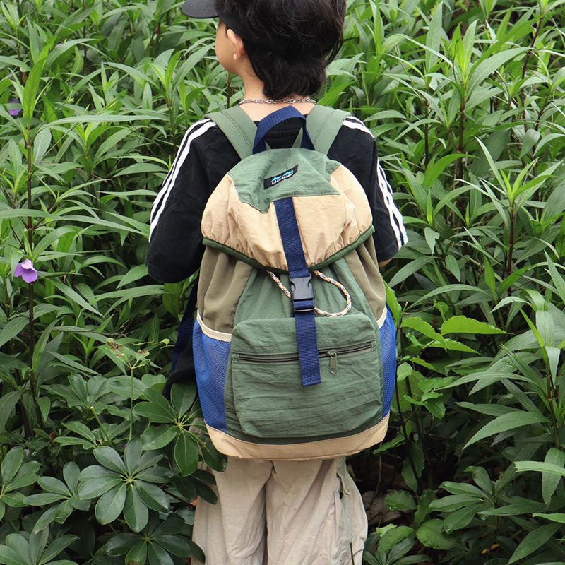 Bolso de viaje simple y casual de gran capacidad 2025 nueva mochila para estudiantes con cordón Mochila para niños de moda coreana