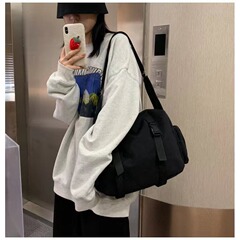 斜め掛けのズックの女性の香港風の大容量の日本の小さいショルダーバッグの女性の肩の斜め掛けのシンプルな布のカバン
