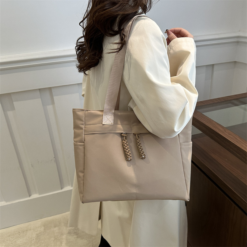 2024 nuevo bolso de tela de gran capacidad para mujeres extranjeras bolso de lona de moda red de nicho de alta calidad bolso de hombro