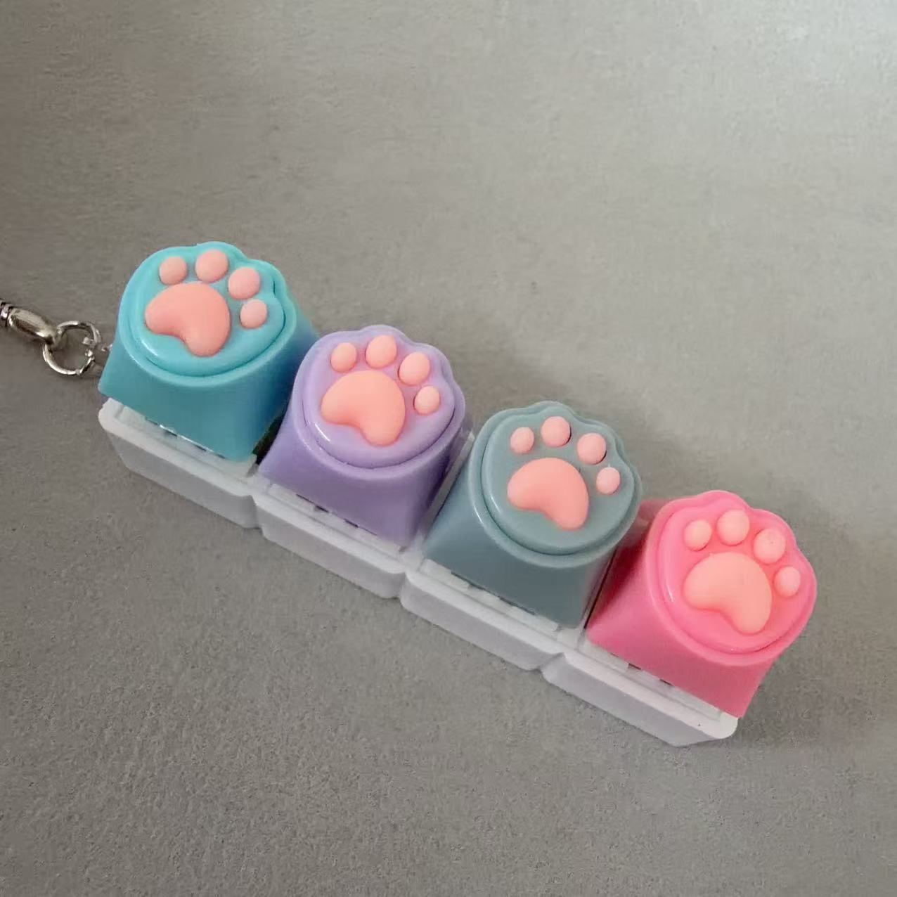 Four-button white shell-silicone cat claw (blue, purple, gray and pink)