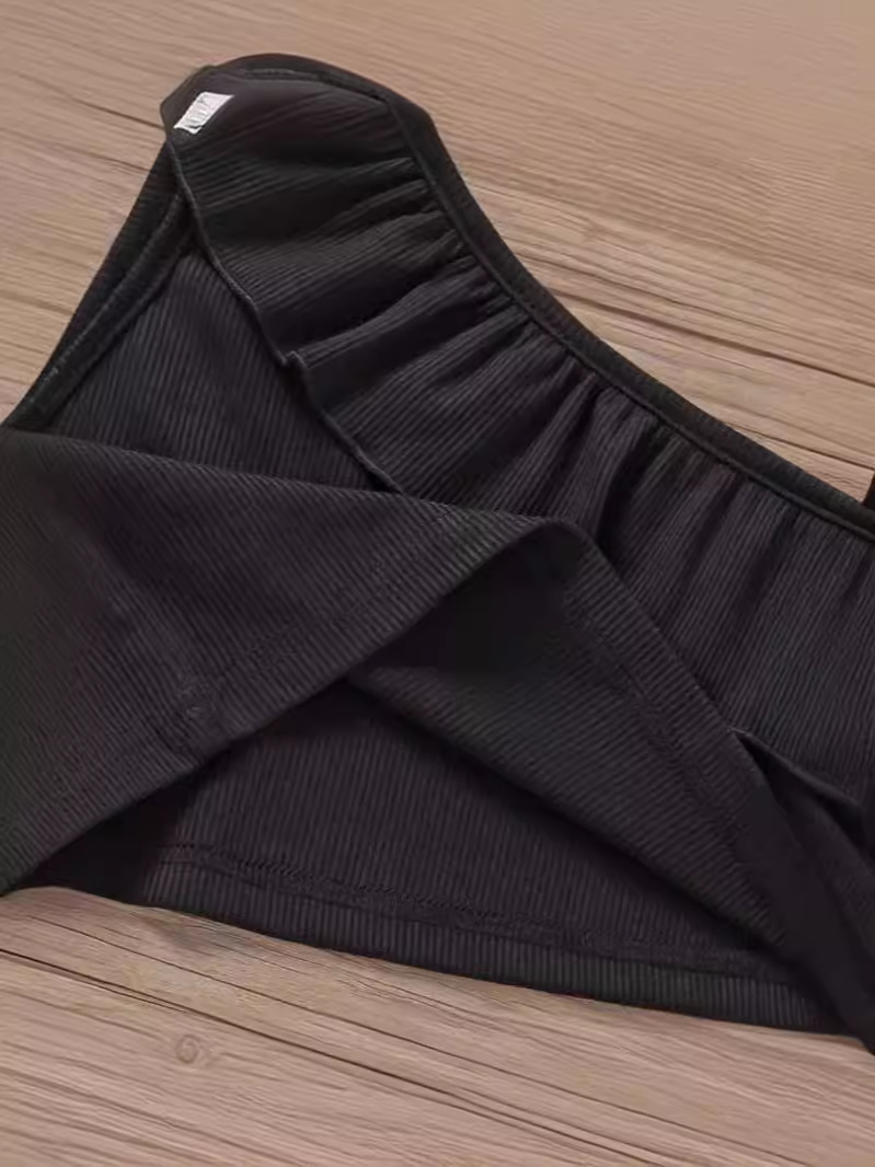 Niñas de verano bebé extranjero estilo de moda personalidad de niños coreano corto encaje hombro abierto chaleco de hombro irregular