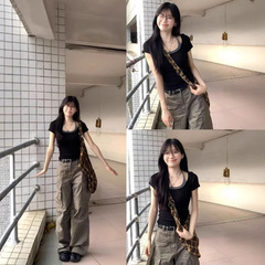 アメリカのレトロな黒い偽の2つの肩の半袖のtシャツの女性の夏のギャルは短い上着の女性の卸売りをつなぎ合わせます。