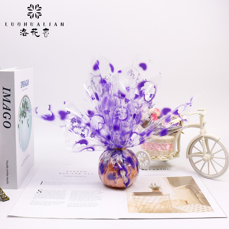 Papel de embalaje de flores, papel de vidrio transparente, papel de embalaje de manzanas de navidad, ramo de flores de corazón, fábrica de papel de embalaje de regalos al por mayor