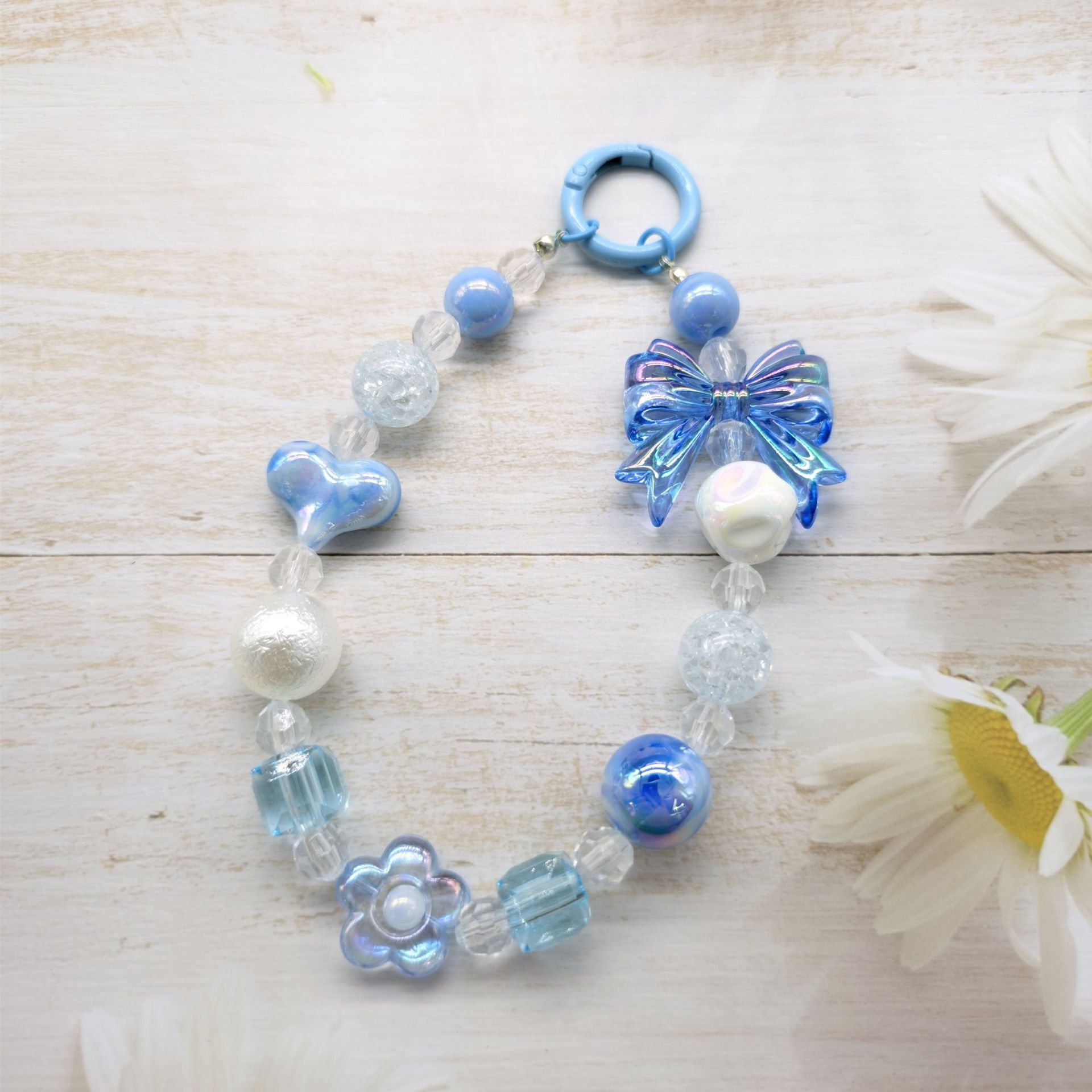 2023 nuevo llavero de cadena de cuentas redondas amor arco colgante Cadena de teléfono móvil colorido fresco perla color sólido coincidencia