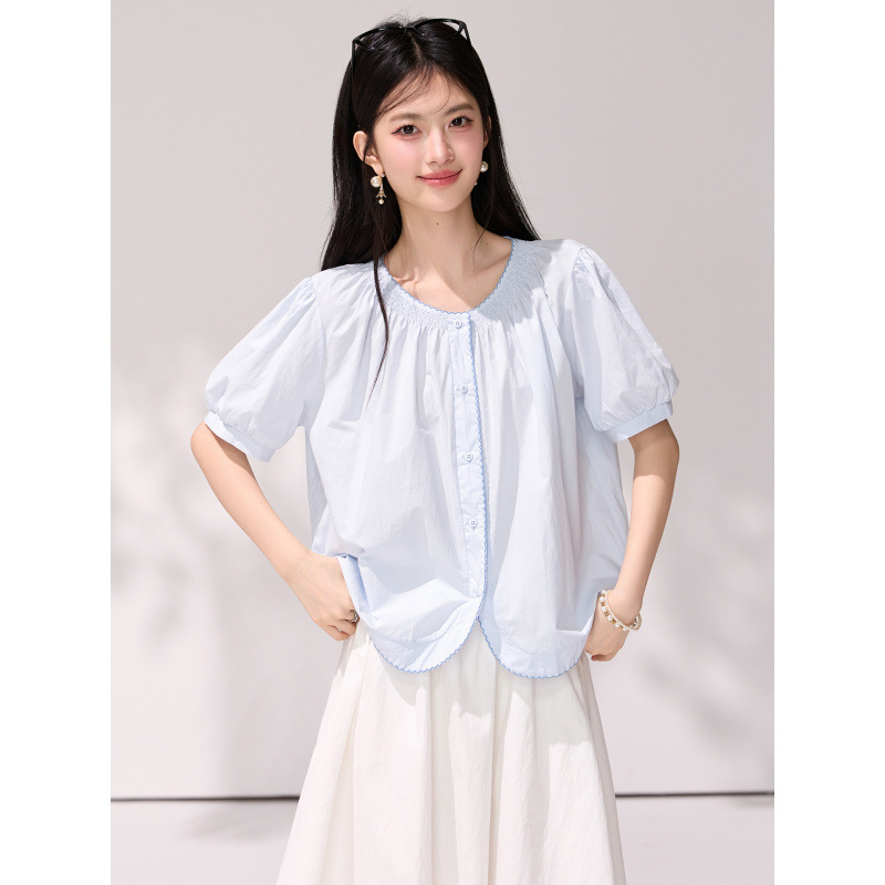 2026 Summer New Style French Light Blue Puff Sleeve Short-Sleeved Pleated Round Neck Lace Loose Gentle Style Shirt for Women 2026 Summer New Style French Light Blue Puff Sleeve Short-Sleeved Pleated Round Neck Lace Loose Gentle Style Shirt for Women