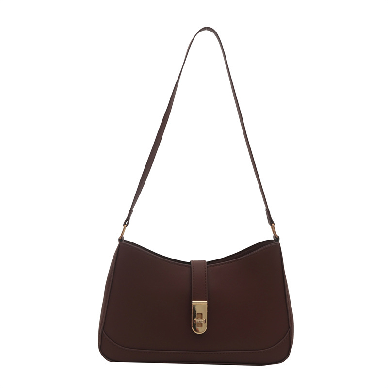 El popular diseño de nicho de este año 2024 nuevo bolso de mensajero de color sólido de moda bolso de hombro de moda bolso de axila con cerradura de estilo occidental