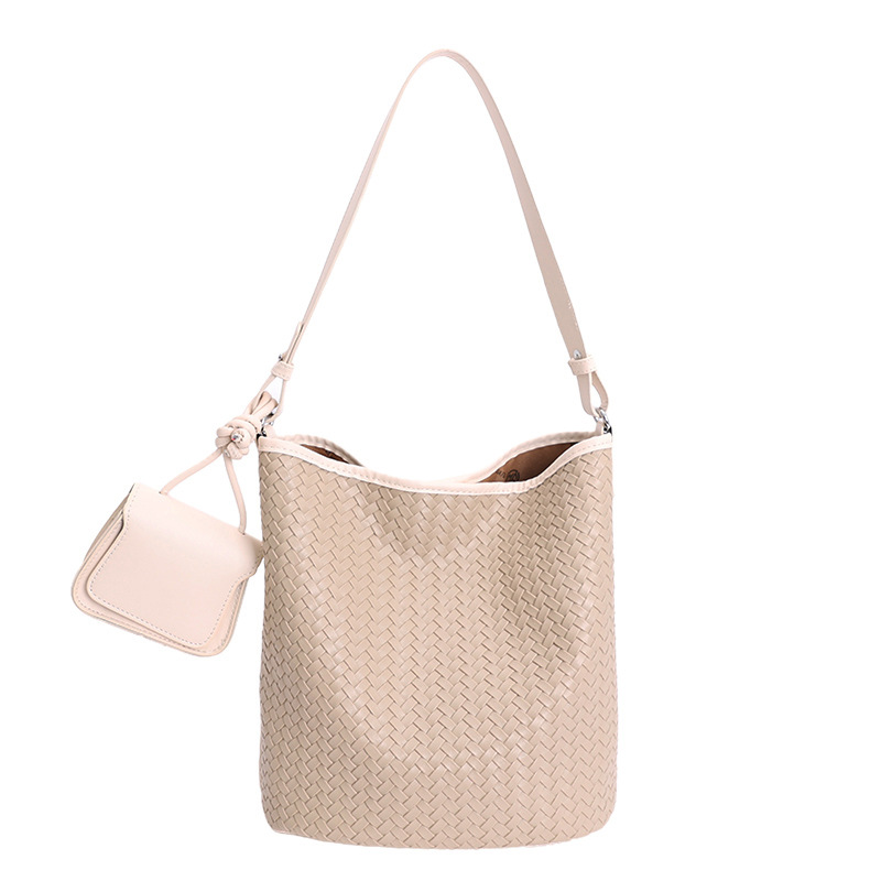 Diseño coreano de nicho de tejido bolso de cubo de agua de mujer nueva textura de alta calidad de hombro versátil bolso de tramo inclinado