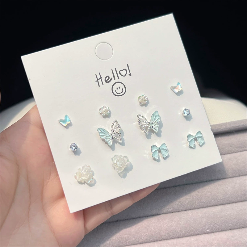 Earrings with bow, sophisticated set from pearl, flowered