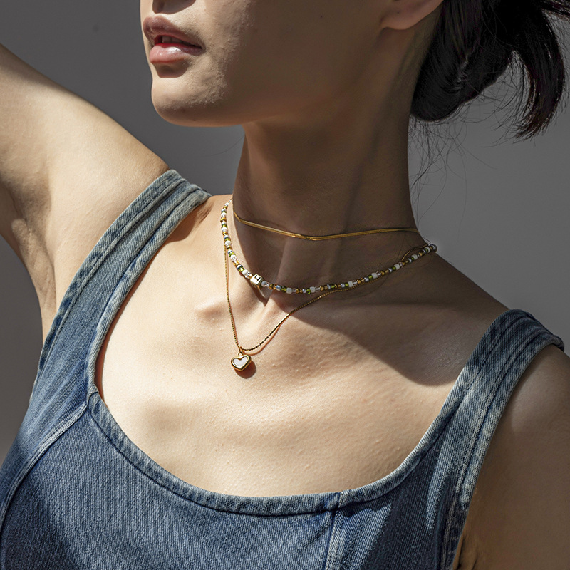 TENA Europa y los Estados Unidos original nicho de diseño amor conchas de arroz cuentas puro collar de acero inoxidable conjunto de collares