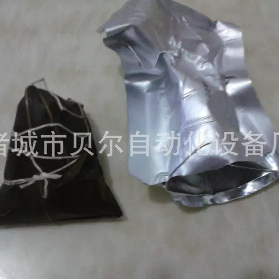 铝箔膜双面拉伸真空包装机-鱼豆腐牛肉干铝箔切圆角包装-诸城贝尔