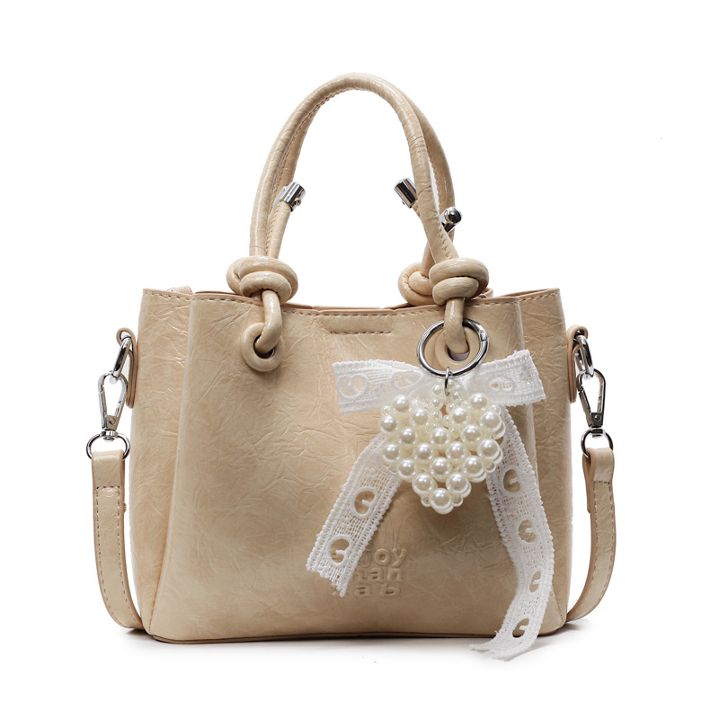 Bolso de mano de tendencia de comercio exterior femenino 2025 nuevo estilo plisado todo-fósforo bolso de hombro retro de alta gama ocio cubo bolso