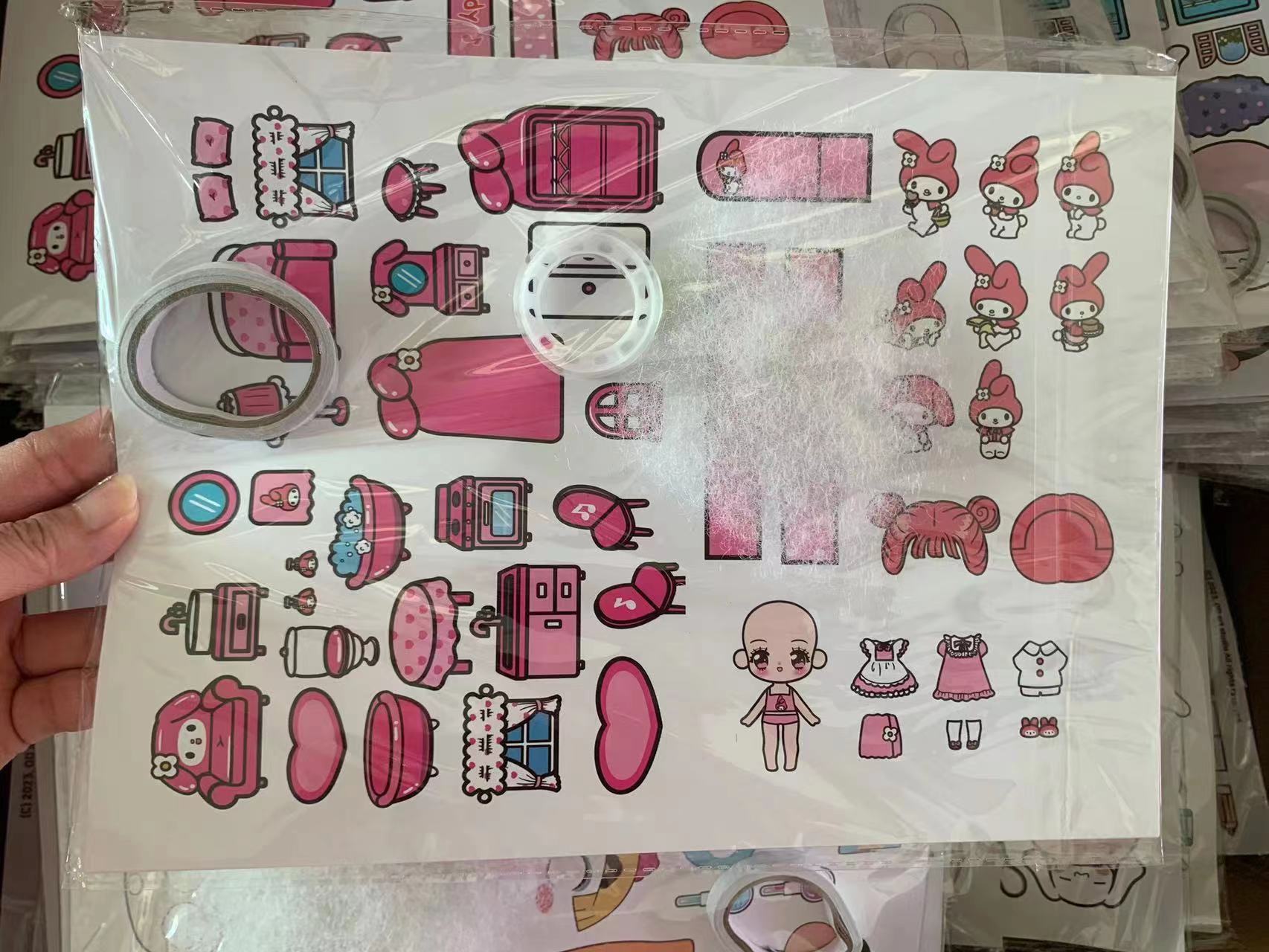 Quiet Book paquete de material titular la tarjeta hecha a mano DIY Internet celebridad descompresión juguete al por mayor dibujos animados coolomi rompecabezas