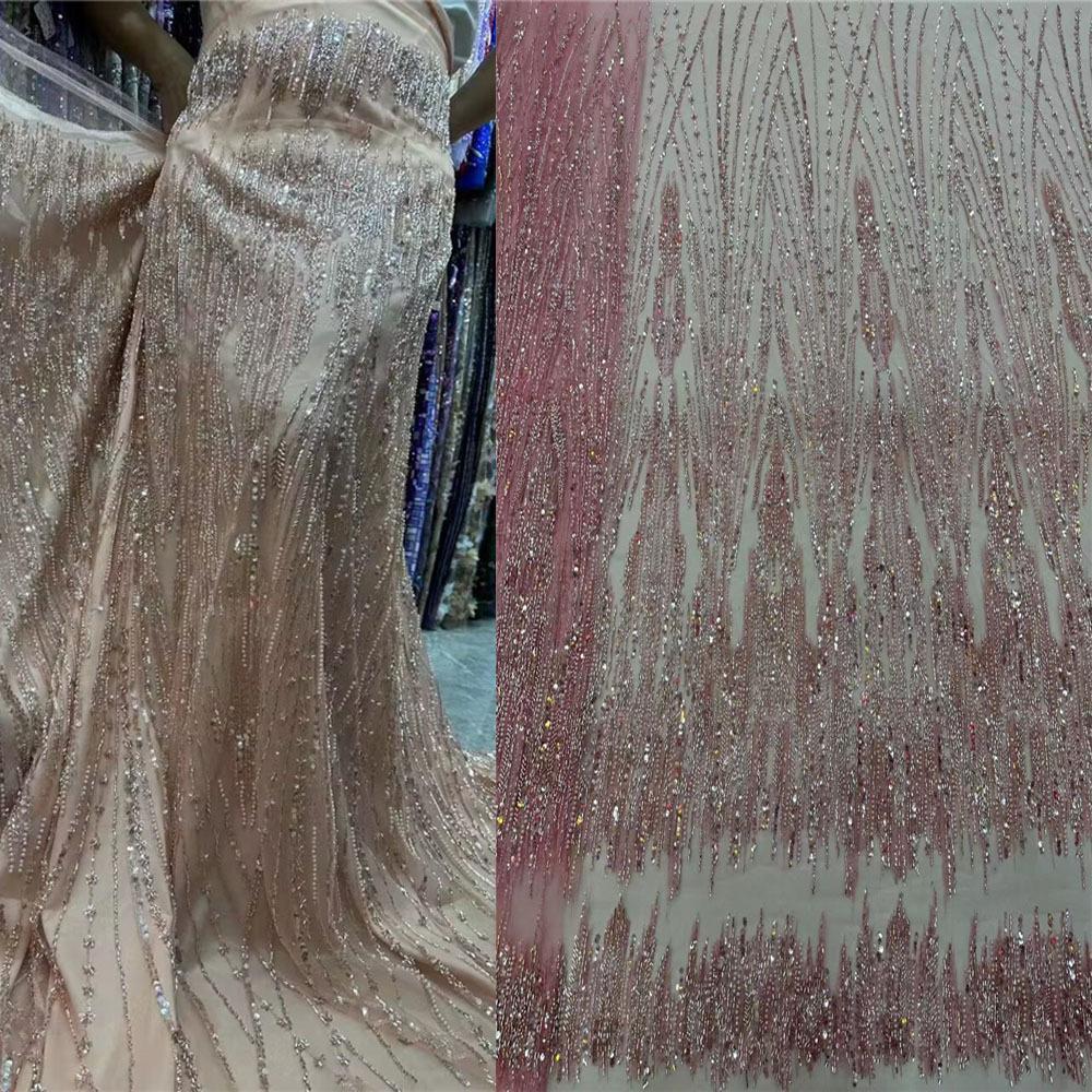 新款珠管绣蕾丝网纱刺绣亮片绣花布网布底珠绣花礼服婚纱面料批发