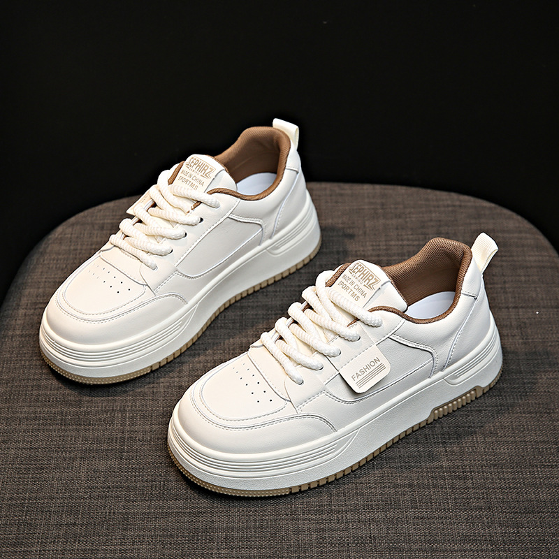 Zapatos blancos para mujer 2025 primavera nuevo estilo coreano versátiles zapatillas de suela gruesa que aumentan la altura zapatos casuales zapatos deportivos para mujer.