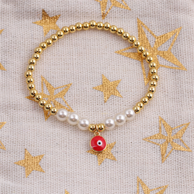 Korean copper-plated real gold dripping oil devilu0027s eye beads bracelet wholesale Nihaojewelry