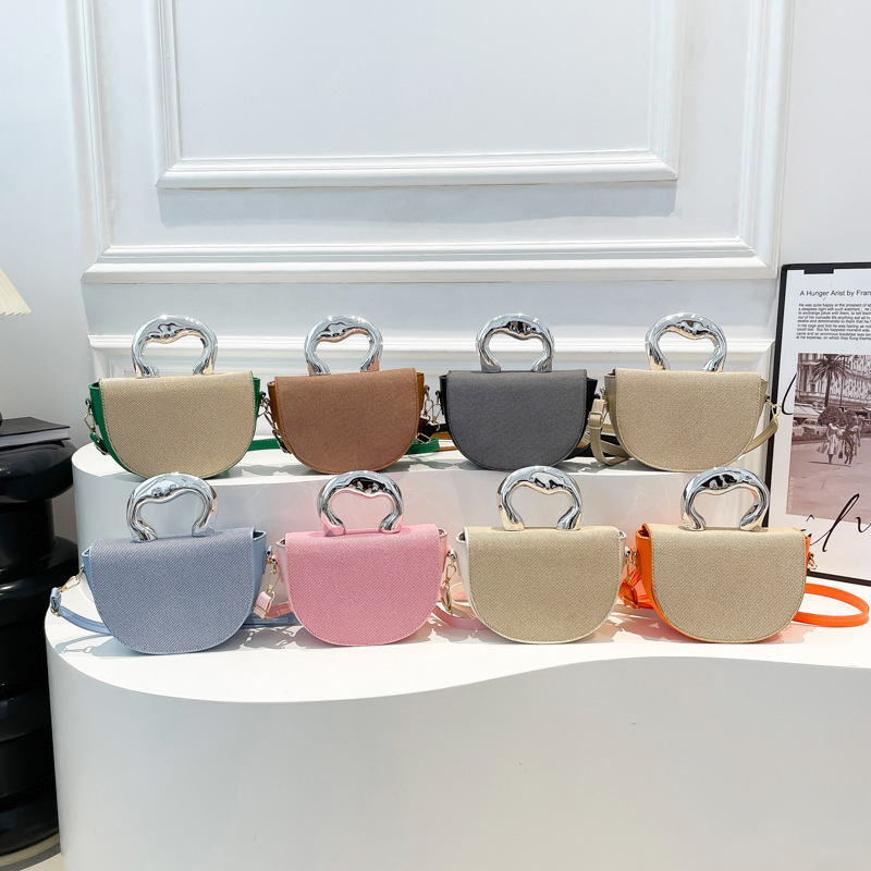 Bolso de diseño de nicho 2025 primavera nuevo bolso de mujer bolso de hombro de moda personalizado bolso de mensajero de costura de color de contraste marea