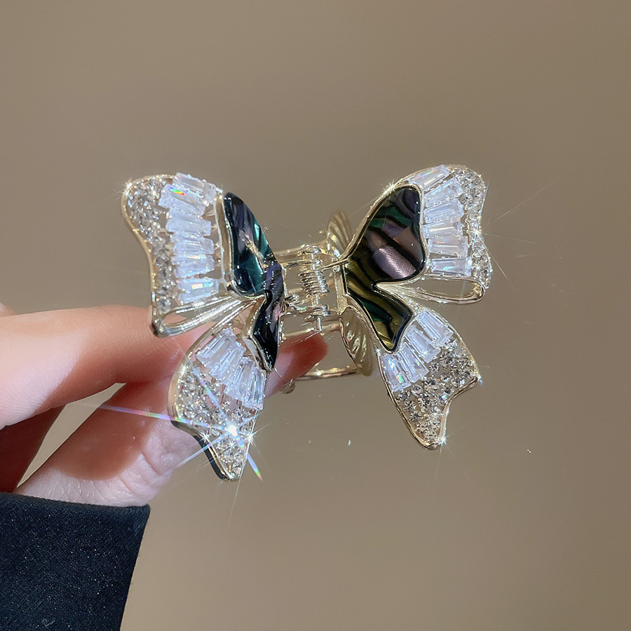 Zircon Fritillaria Horquilla de mariposa de doble capa Temperamento exquisito de alta calidad Clip de tiburón en la parte posterior de la cabeza Clip de agarre de moda Accesorios para el cabello femenino