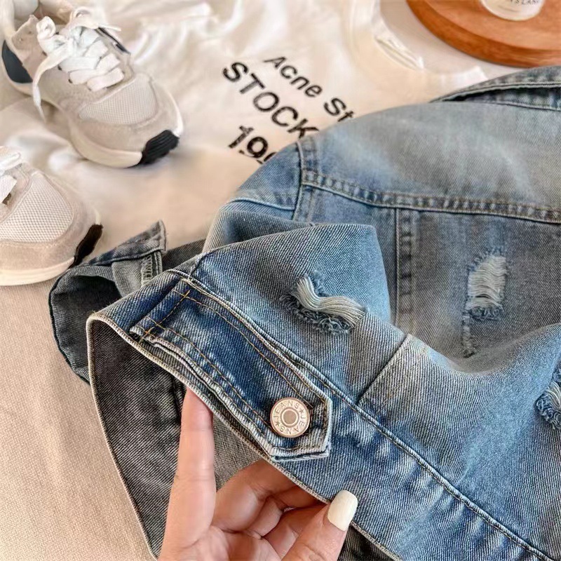 Chaqueta de mezclilla para niños 2025 otoño nuevo estilo niño niña color sólido chaqueta de mezclilla raspada bebé top de todo fósforo