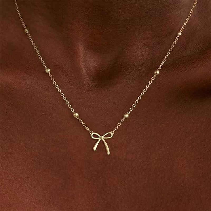 Collier pendentif nœud papillon en perles transfrontalières pour femme, chaîne ras du cou, style mignon, frais, simple et polyvalent, haut de gamme, vente en gros_voghion.com