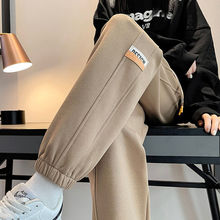 大码卡其色运动裤女秋冬加绒裤子胖mm休闲显瘦宽松束脚哈伦卫裤潮