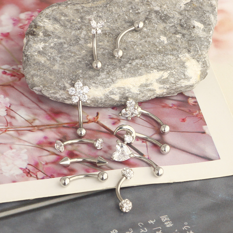 Silver pointed spike labret stud material detail