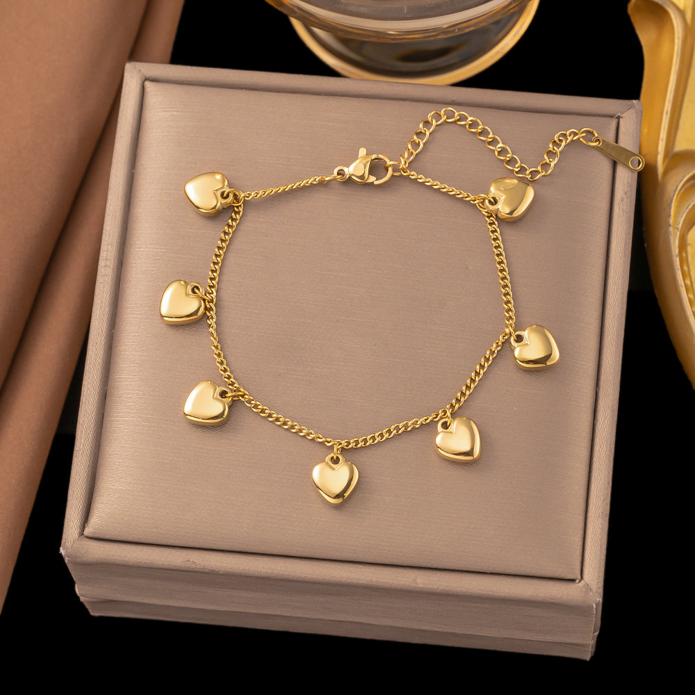 35【e268】seven hearts bracelet gold