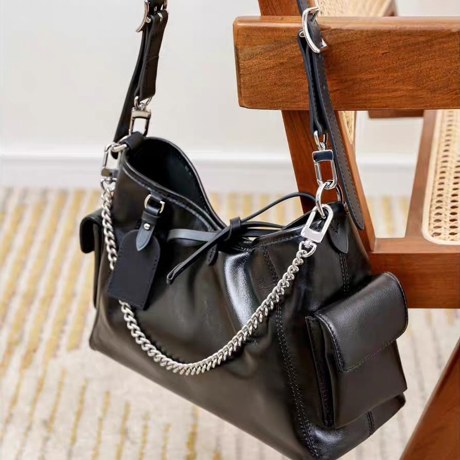 Bolso tote de alta gama y gran capacidad en los Estados unidos, mujer, otoño e invierno 2024, nueva moda, lleno de bolsos inclinados de un hombro para viajeros