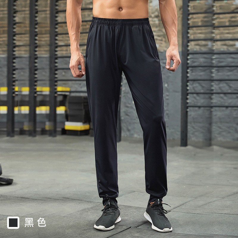 Fábrica de fuerza para correr pantalones deportivos de otoño elásticos rápidamente secos pantalones elásticos transpirables ociosos pantalones de pie delgados