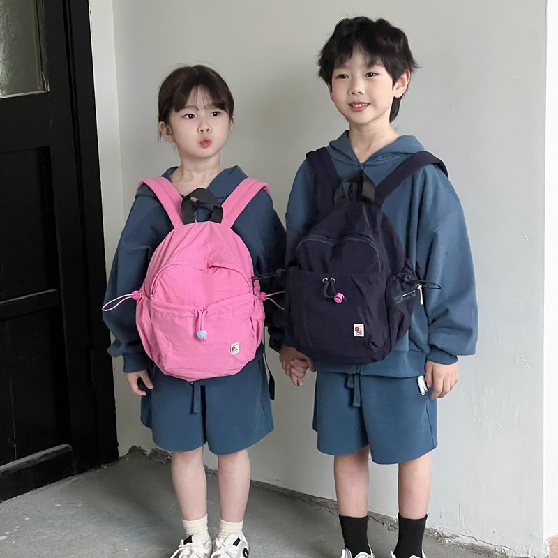 Coreana pequeña mochila fresca para niños y niñas, color macarón jardín de infantes, mochila para bebés, mochila de cuerda sólida para niños
