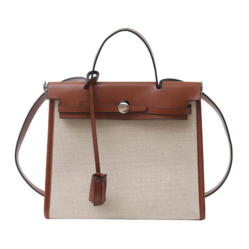Bolso Carey Tote portátil de alta gama 2025 Nuevo estilo transfronterizo Bolso bandolera de gran capacidad de contraste de lona