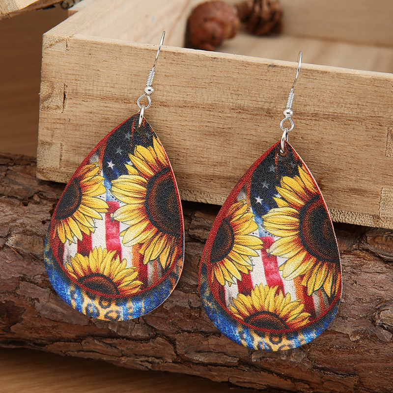 New Drop-shaped Retro Sunflower Leather Lychee Pattern Pu Earrings Metal display picture 2