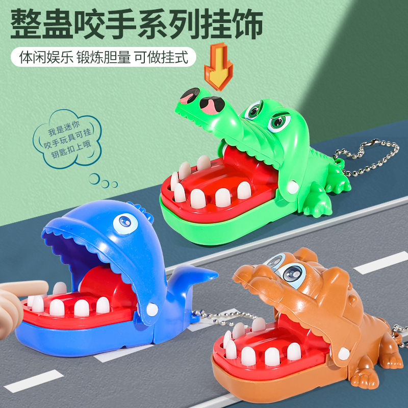 Cocodrilo pequeño muerde juguetes de dedo ballena juegos de extracción de dientes cocodrilo padres e hijos muerde juguetes de hechicería para niños al por mayor