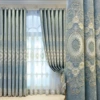 Light blue cloth curtain holes