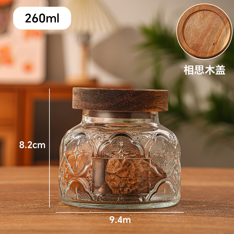 Retro en relieve Begonia flores vidrio almacenamiento de latas de sellado doméstico granos de café flores de té nueces almacenamiento de latas de gran abdomen