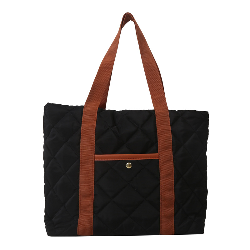 Bolsa de ropa de algodón, bolso de pluma de algodón de mujer, bolso coreano ligero 2025, nuevo estilo de aire extranjero, bolso de hombro de gran capacidad.
