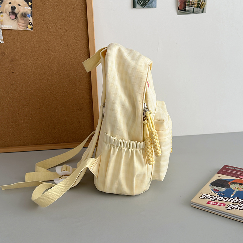 Mochila nueva mochila de todo fósforo, estudiante de secundaria japonesa, estudiante de secundaria, bolso de estudiante de viaje, versión coreana, mochila de color sólido simple al por mayor