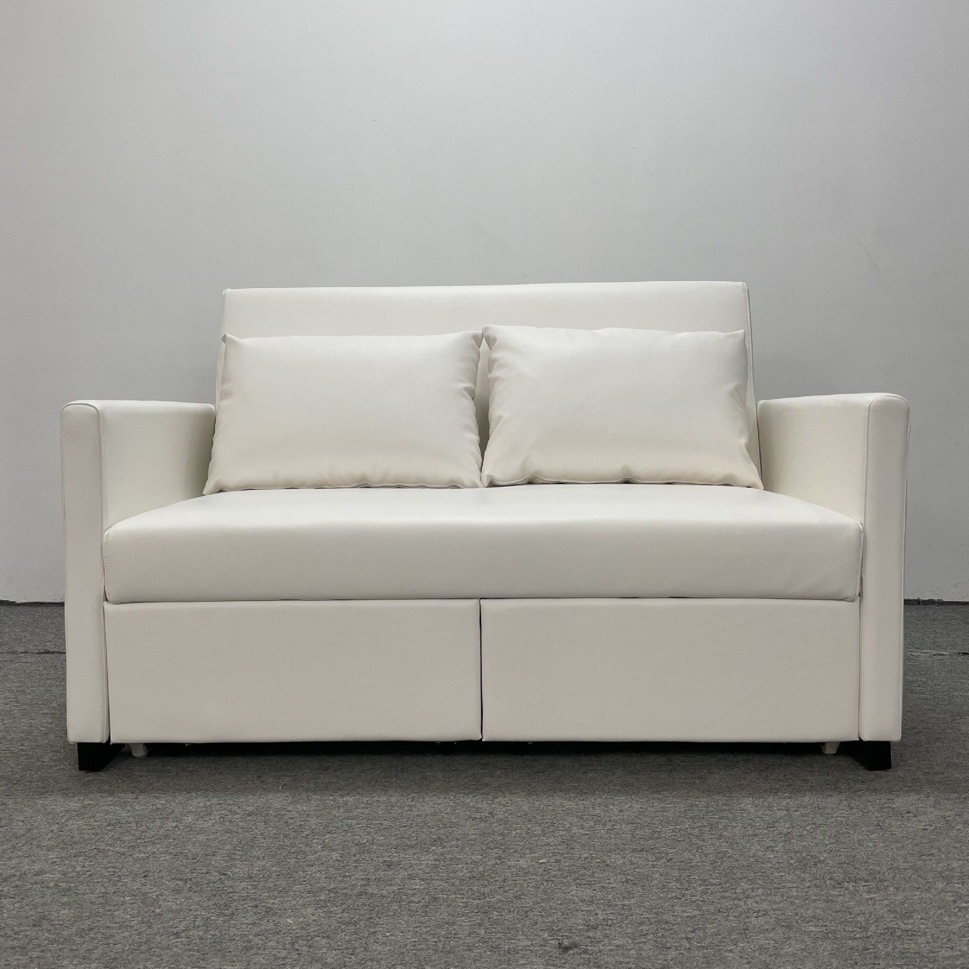 Sofá cama de cuero multifuncional, moderno y simple sofá de estilo de viento en la sala de estar.