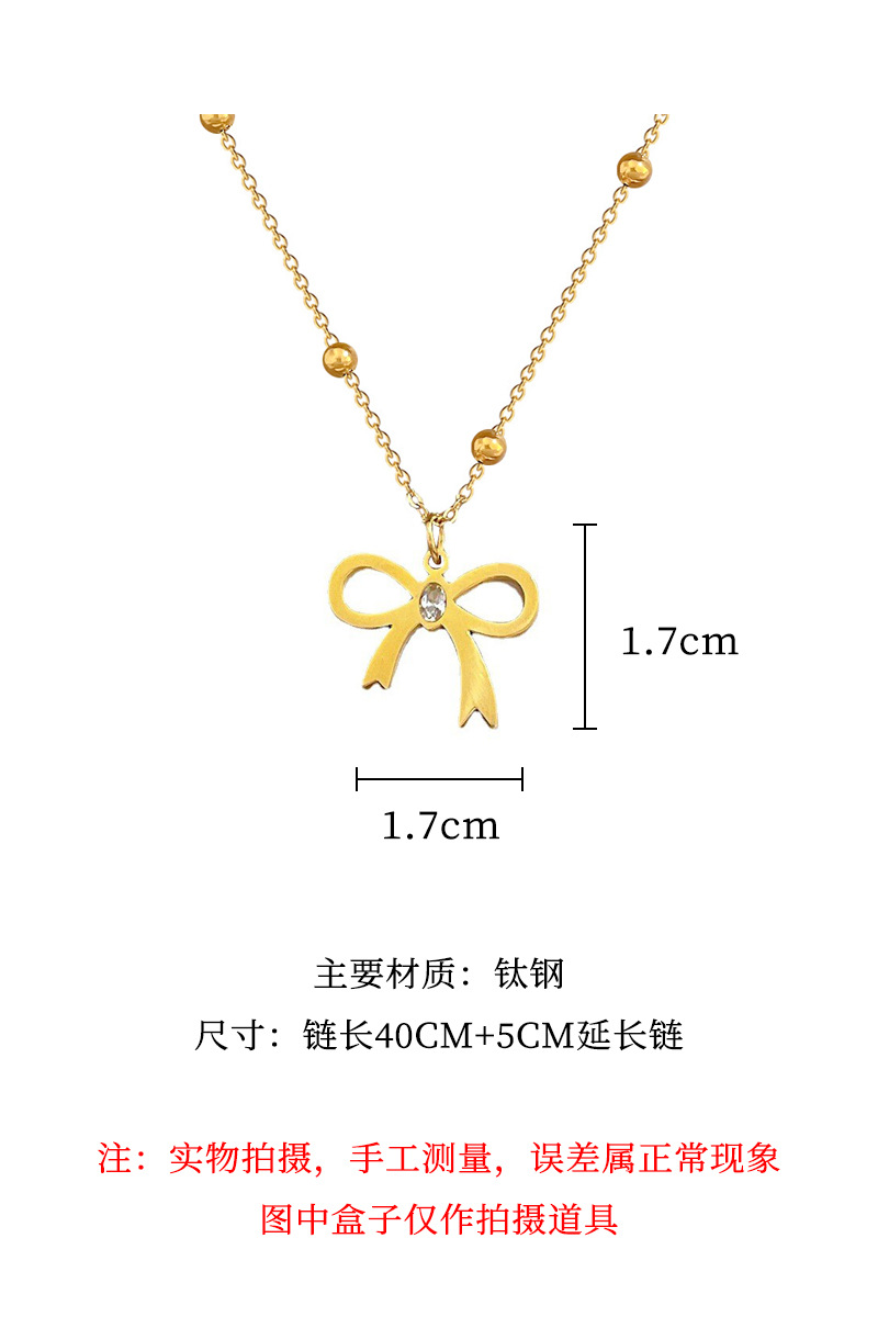 [Acciaio al titanio a corpo intero] Fiocco in zircone in una semplice fornace a vento, collana in oro autentico, maglia rossa femminile_voghion.com